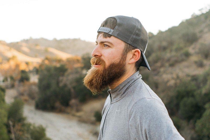 John Crestani outside looking dapper with his manly-mans mountain beard